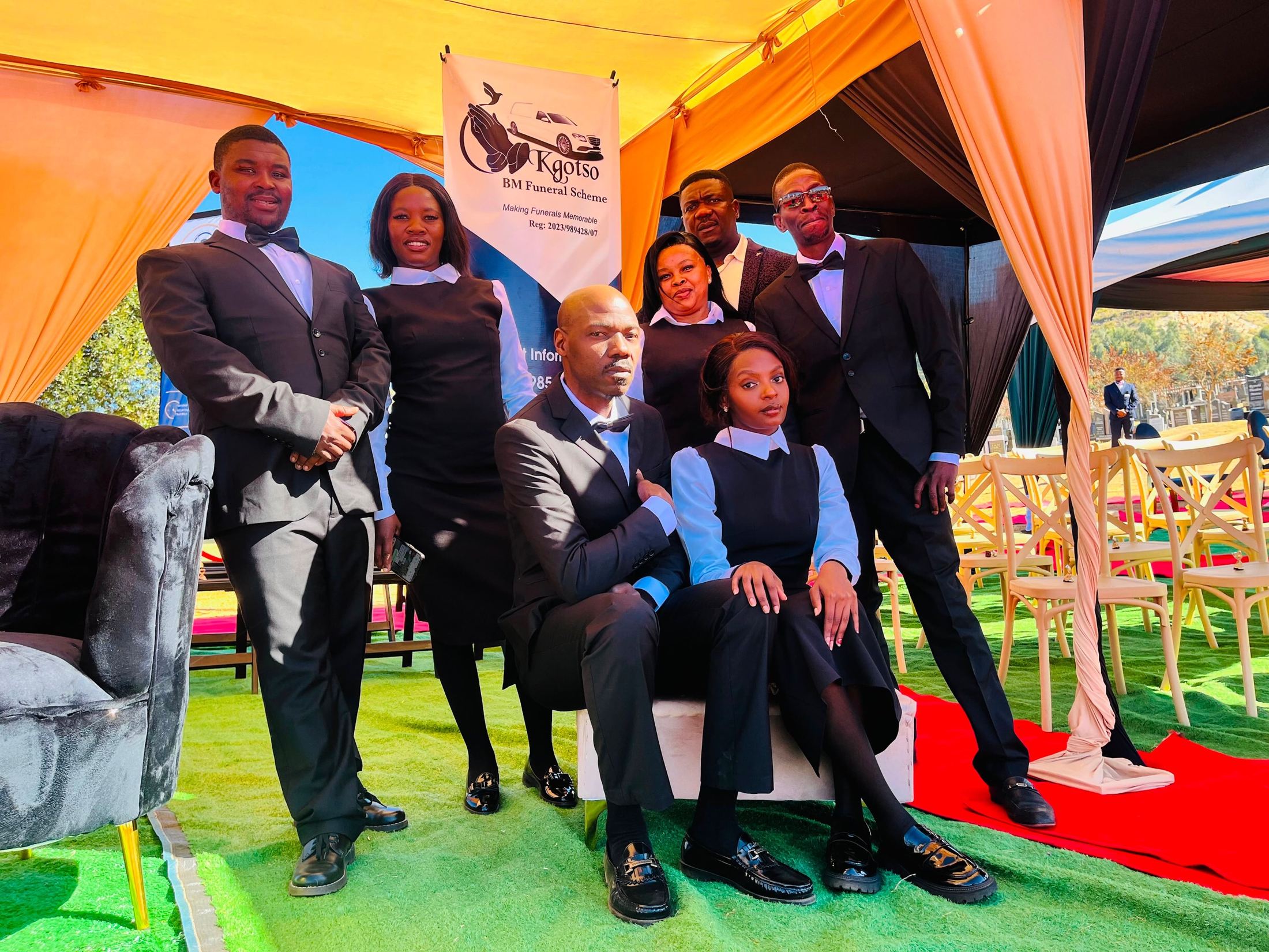 Kgotso team beneath the service tent